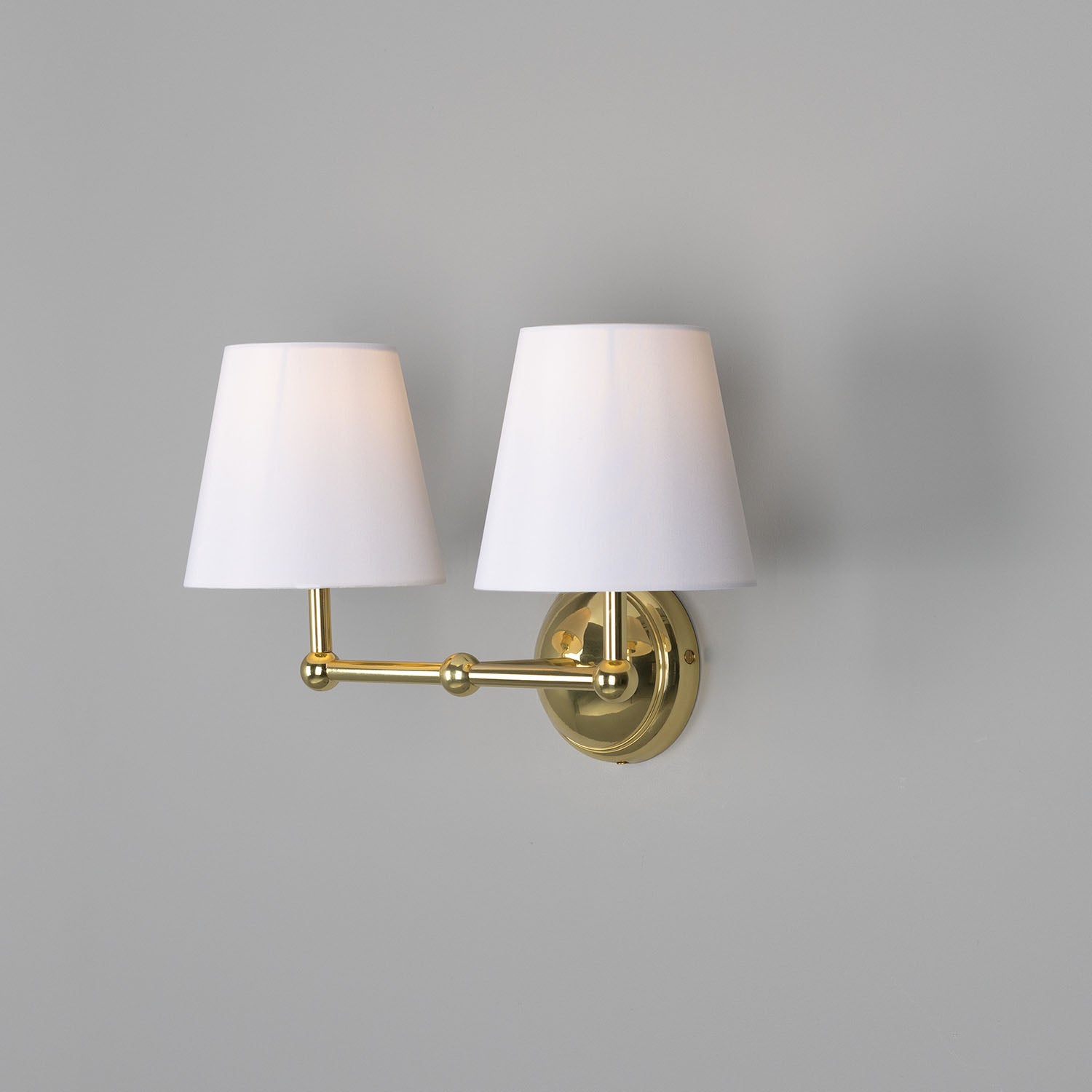 Busan Modern Brass Double Wall Light with Fabric Shades - Subtle Wear
